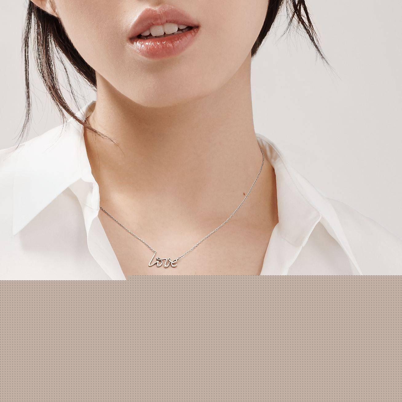 T*f*ny palomas graffiti love pendant